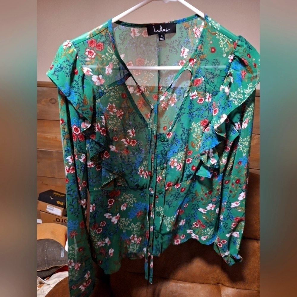 A Lulu's long sleeve sheer button-down floral top with ruffled sleeves in small.